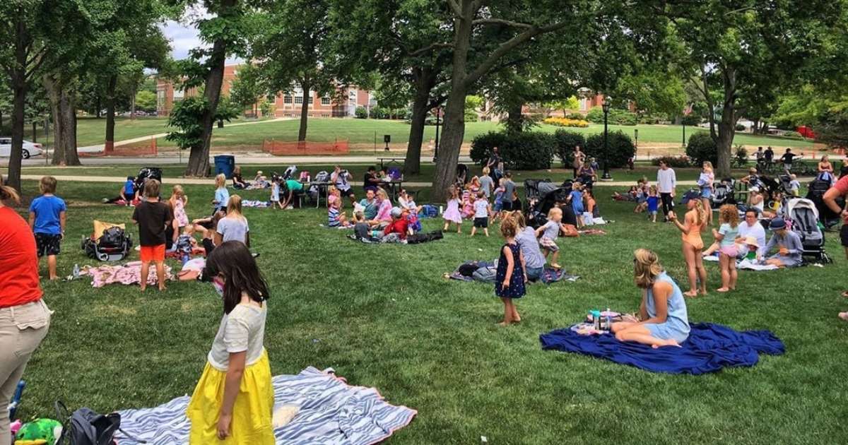 Children and families gathered at a park in Hinsdale