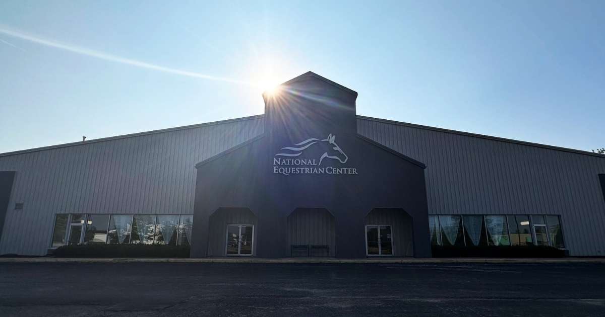 The exterior of the National Equestrian Center on a sunny day