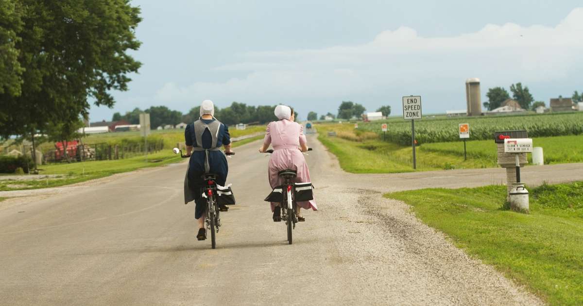 Two Amish women on bicycles